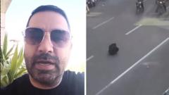 ویدئوی معترض نشسته جلوی پلیس؛ فیلمبردار: خود را برای اجرای حکم ۱۰ سال زندان معرفی می‌کنم